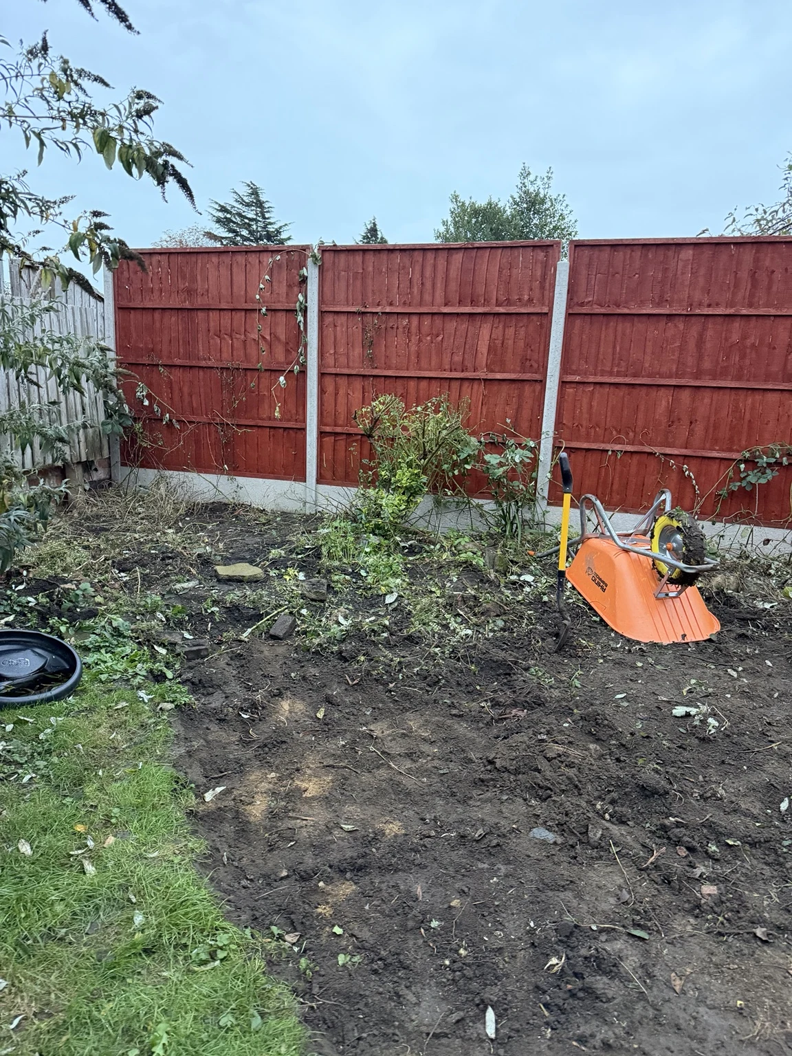 The same Oadby garden area cleared and dug out for a flowerbed and slab area